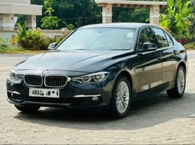 2017 BMW 3 Series 320d Luxury Line in black — photo 2 of 6