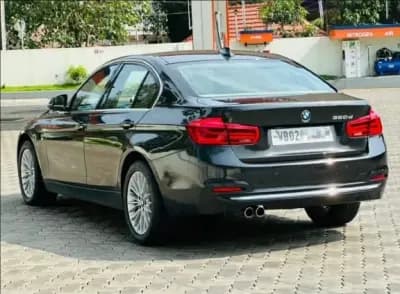 2017 BMW 3 Series 320d Luxury Line in black — photo 3 of 6