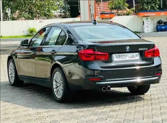 2017 BMW 3 Series 320d Luxury Line in black — photo 3 of 6