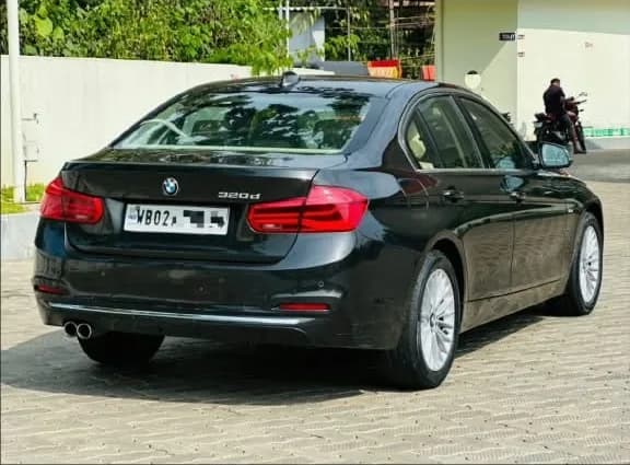 2017 BMW 3 Series 320d Luxury Line in black — photo 4 of 6