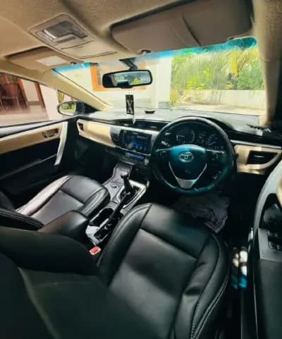 2016 Toyota Corolla Altis G in silver — photo 4 of 4