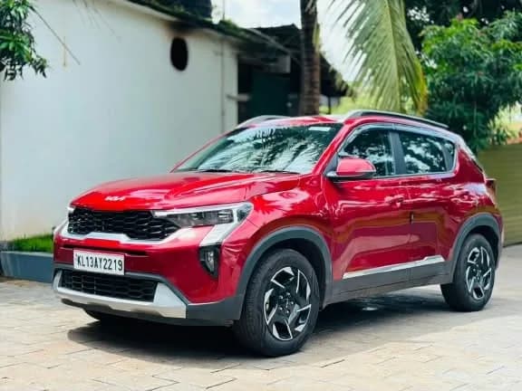 2024 Kia Sonet HTK+ iMT in red for sale in Uliyil, Kannur