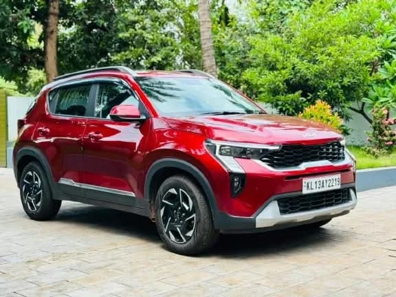 2024 Kia Sonet HTK+ iMT in red — photo 2 of 6