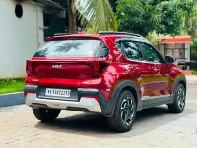 2024 Kia Sonet HTK+ iMT in red — photo 4 of 6