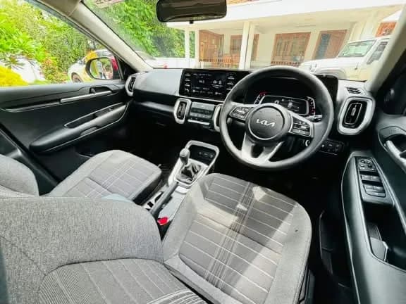 2024 Kia Sonet HTK+ iMT in red — photo 5 of 6
