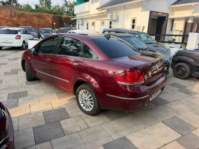 2009 Fiat Linea in maroon — photo 4 of 10