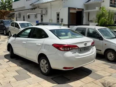 2021 Toyota Yaris J in white — photo 3 of 10