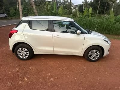 2020 Maruti Suzuki Swift VXi in white — photo 2 of 4