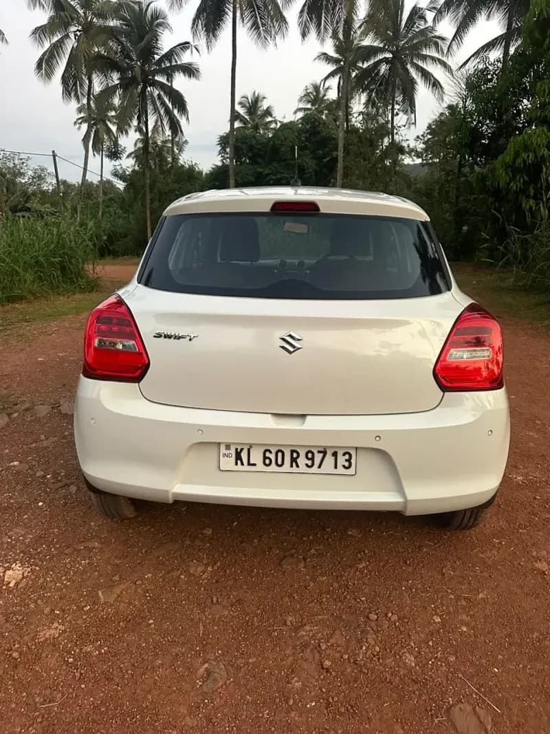 2020 Maruti Suzuki Swift VXi in white — photo 3 of 4