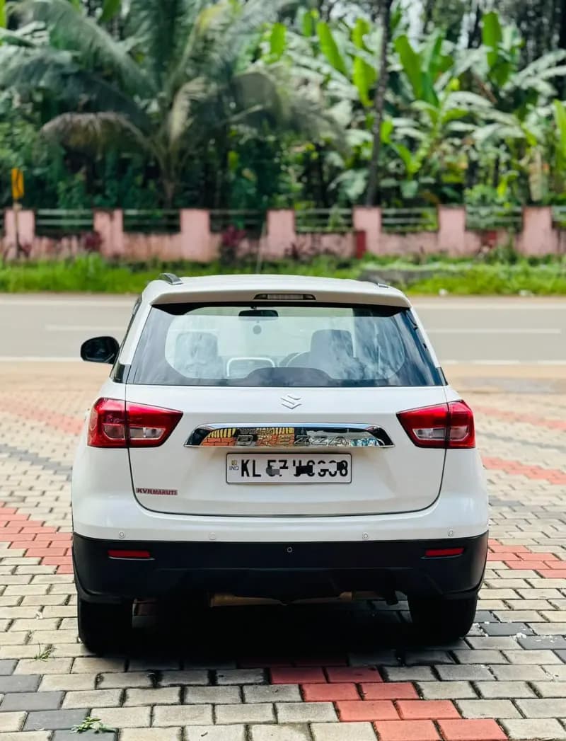 2019 Maruti Suzuki Brezza VDi AMT diesel in white, rear view – RR Motors, Iritty, Kannur