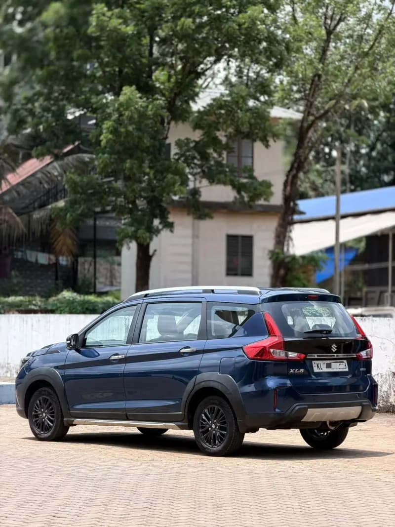 2020 Maruti Suzuki XL6 Zeta petrol in blue, rear three-quarter view – RR Motors, Iritty, Kannur