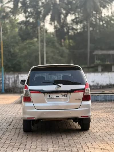 2013 Toyota Innova G4 diesel in silver, rear view – RR Motors, Iritty, Kannur