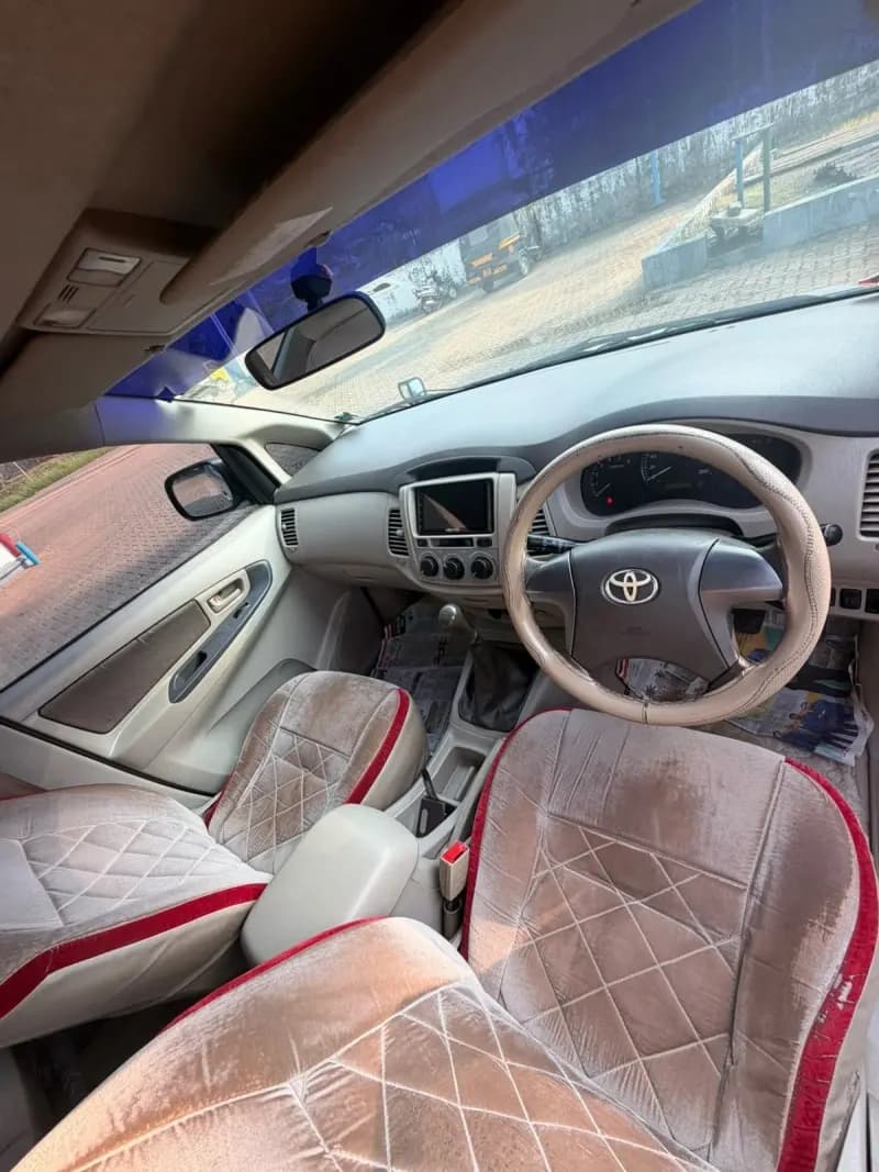 2013 Toyota Innova G4 diesel in silver, dashboard and front seats – RR Motors, Iritty, Kannur