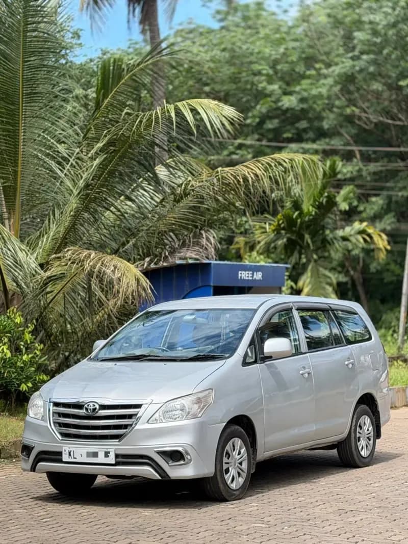 2010 Toyota Innova G4 diesel in silver, front three-quarter view from the left – RR Motors, Iritty, Kannur