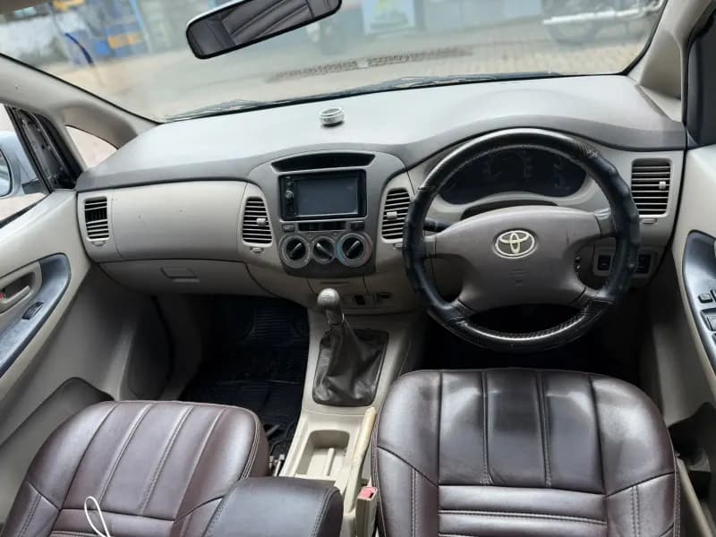 2010 Toyota Innova G4 diesel in silver, dashboard and steering – RR Motors, Iritty, Kannur