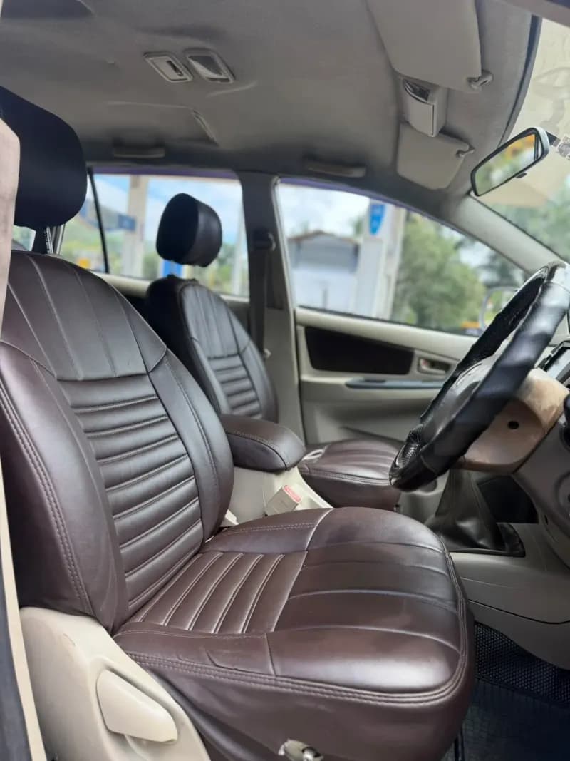 2010 Toyota Innova G4 diesel in silver, front seats – RR Motors, Iritty, Kannur