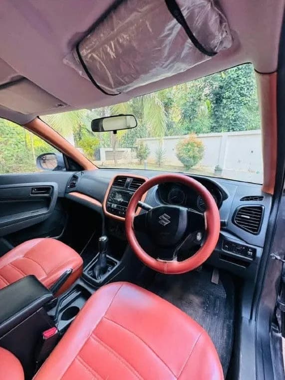 2018 Maruti Suzuki Vitara Brezza VDi diesel in grey, dashboard and manual gear lever – Car City, Mattanur, Kannur