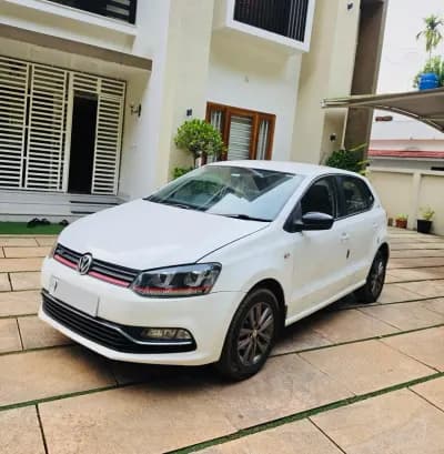 Used 2015 Volkswagen Polo GT TSI automatic petrol in white, front three-quarter view, for sale at Car City, Mattanur, Kannur