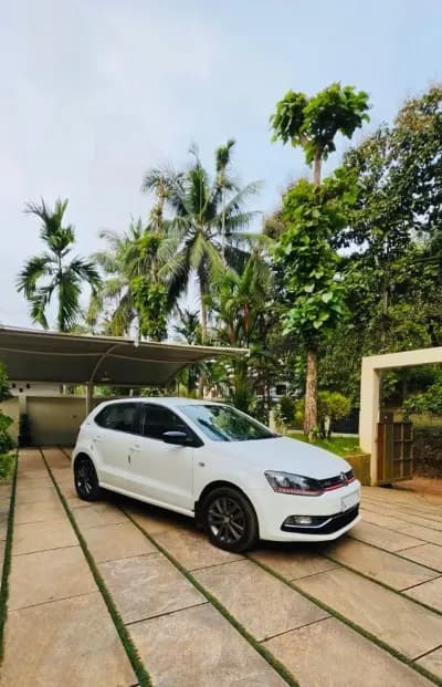 2015 Volkswagen Polo GT TSI automatic petrol in white, side three-quarter view – Car City, Mattanur, Kannur