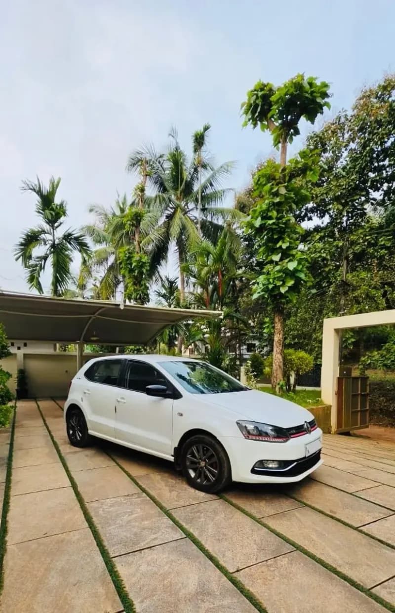 2015 Volkswagen Polo GT TSI automatic petrol in white, side three-quarter view – Car City, Mattanur, Kannur