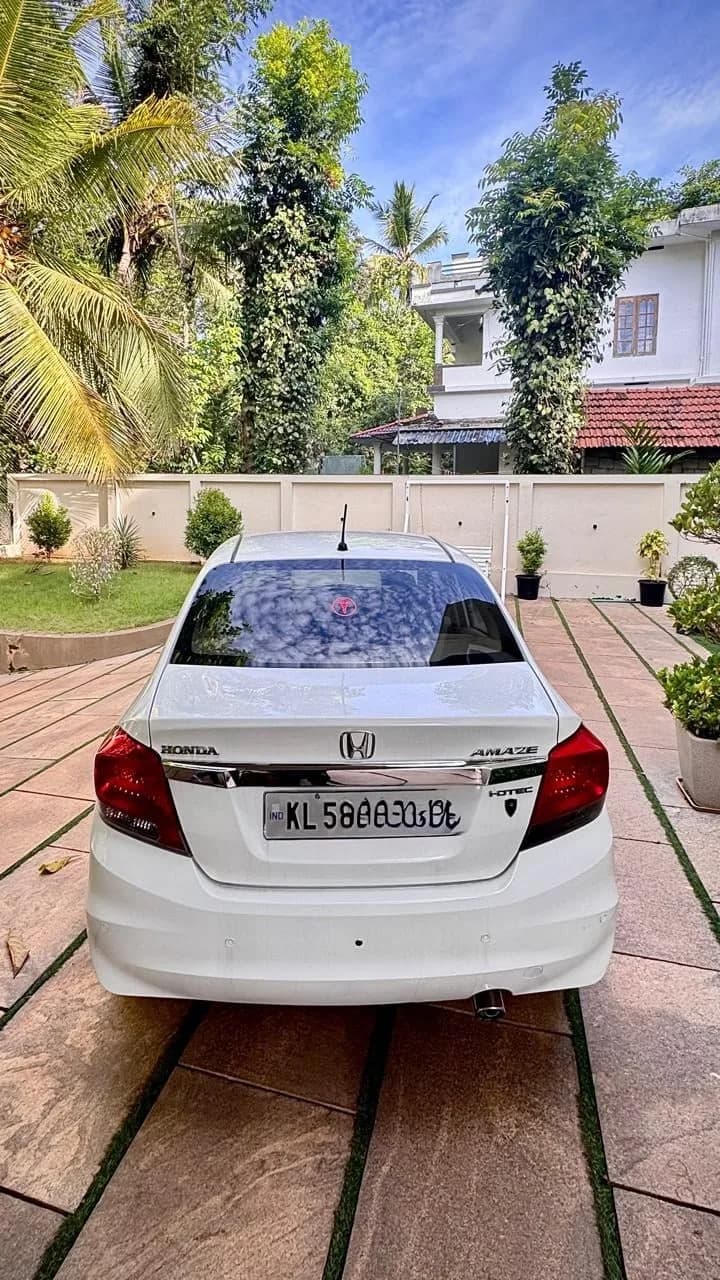 2015 Honda Amaze 1.5 E diesel in white, rear view – Car City, Mattanur, Kannur
