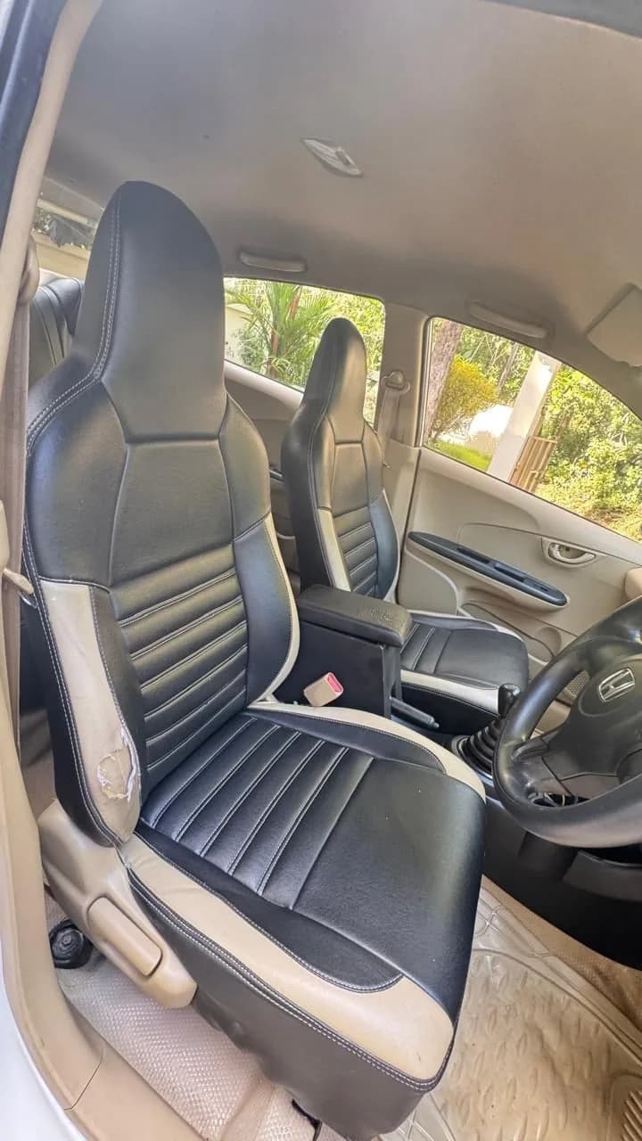 2015 Honda Amaze 1.5 E diesel in white, front seats – Car City, Mattanur, Kannur