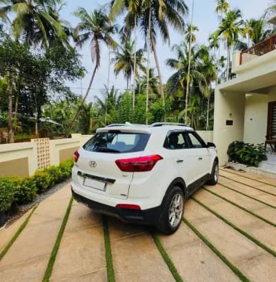 2017 Hyundai Creta SX(O) 1.6 CRDi diesel in white, rear three-quarter view – Car City, Mattanur, Kannur
