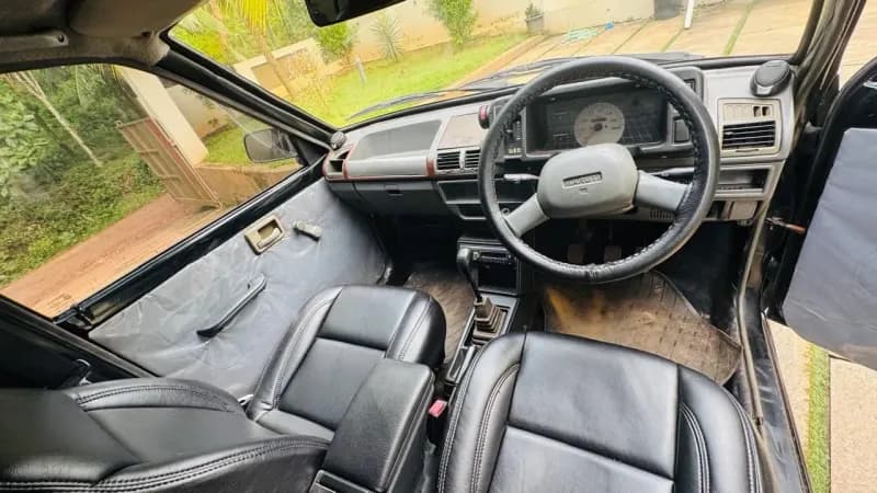2013 Maruti Suzuki 800 AC petrol in black, dashboard and steering – Car City, Mattanur, Kannur
