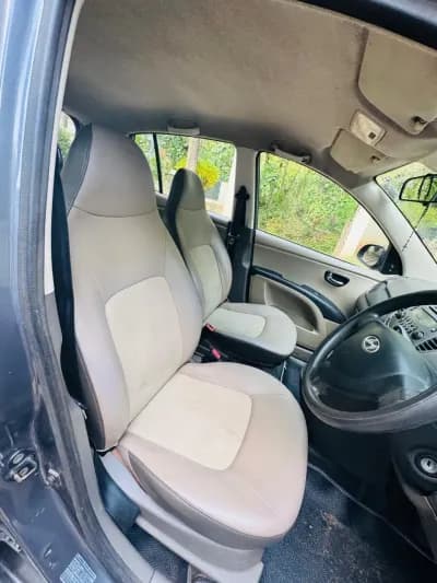 2015 Hyundai i10 Sportz petrol in grey, front seats – Car City, Mattanur, Kannur