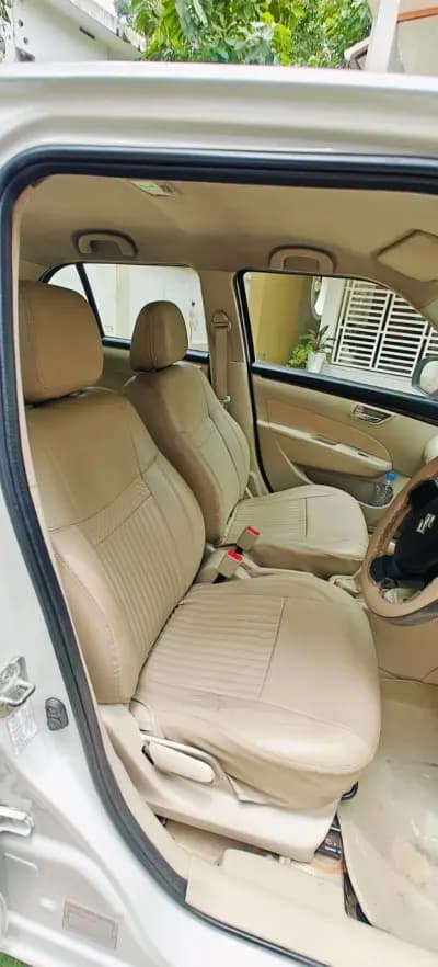 2016 Maruti Suzuki Swift Dzire VXi petrol in white, front seats – Car City, Mattanur, Kannur