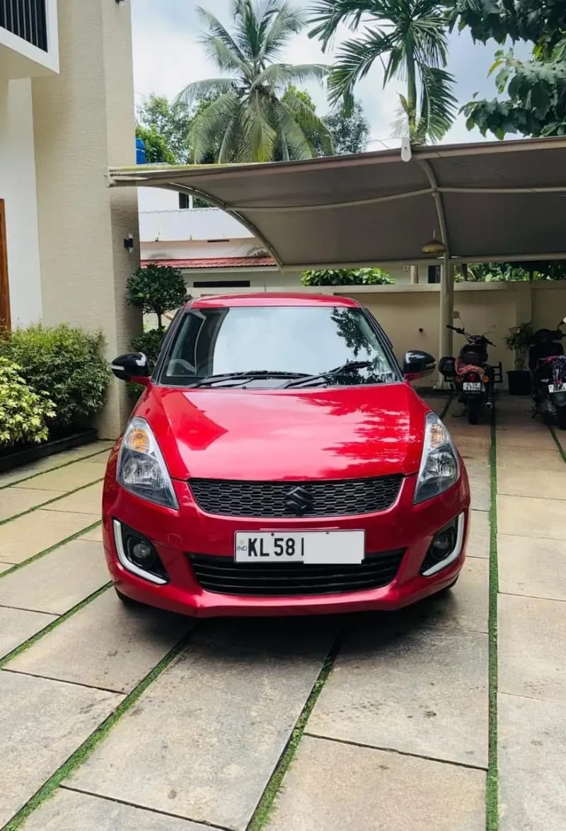 2012 Maruti Suzuki Swift VDi diesel in red, front view – Car City, Mattanur, Kannur