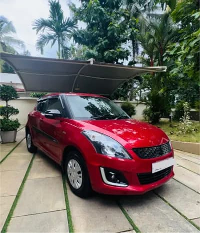 2012 Maruti Suzuki Swift VDi diesel in red, front three-quarter view from the right – Car City, Mattanur, Kannur