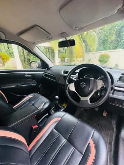 2012 Maruti Suzuki Swift VDi diesel in red, dashboard and manual gear lever – Car City, Mattanur, Kannur