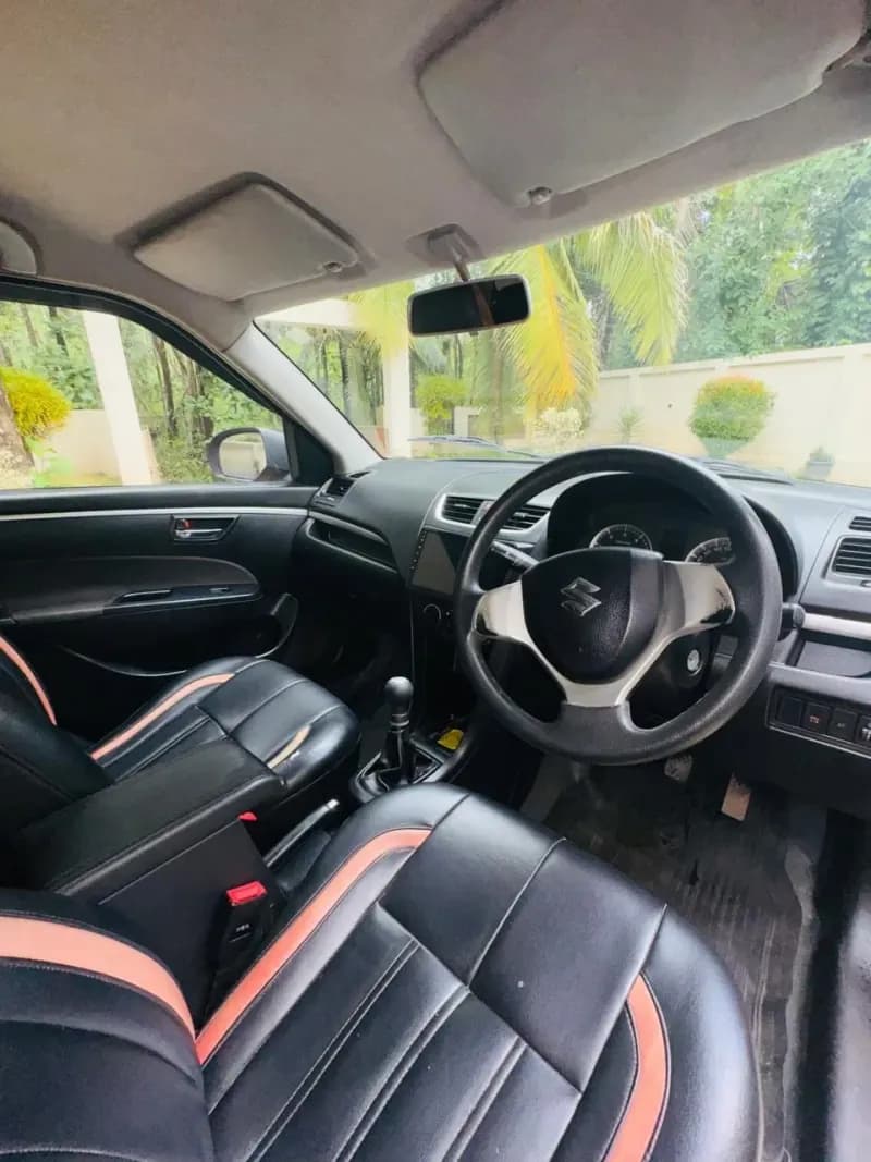 2012 Maruti Suzuki Swift VDi diesel in red, dashboard and manual gear lever – Car City, Mattanur, Kannur