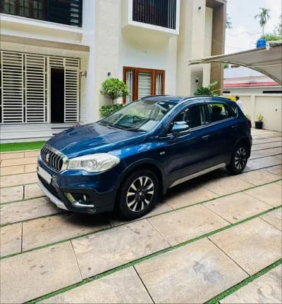 2018 Maruti Suzuki S-Cross Zeta Smart Hybrid diesel in blue, front three-quarter view from the left – Car City, Mattanur, Kannur
