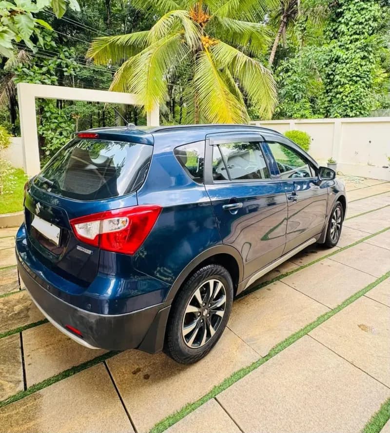 2018 Maruti Suzuki S-Cross Zeta Smart Hybrid diesel in blue, rear three-quarter view – Car City, Mattanur, Kannur