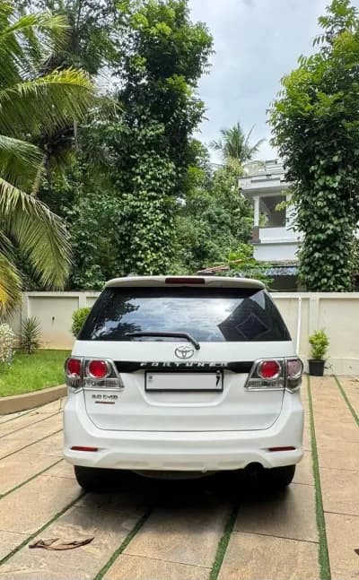 2014 Toyota Fortuner 4x2 automatic diesel in white, rear view – Car City, Mattanur, Kannur