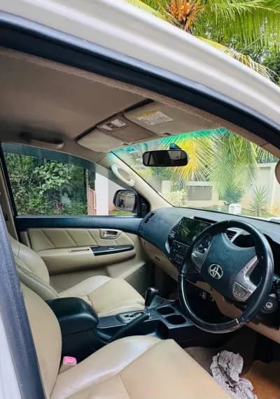 2014 Toyota Fortuner 4x2 automatic diesel in white, front seats – Car City, Mattanur, Kannur