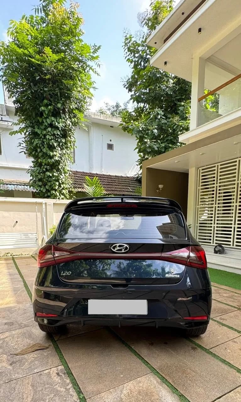 2022 Hyundai i20 Sportz diesel in blue, rear view – Car City, Mattanur, Kannur