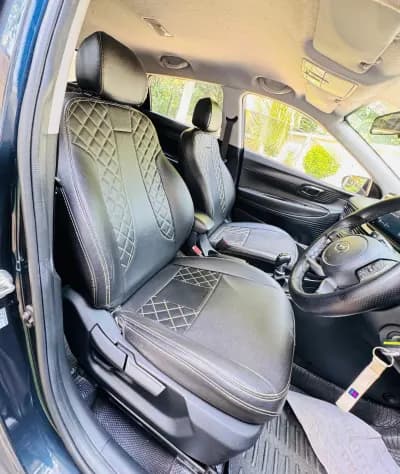 2022 Hyundai i20 Sportz diesel in blue, front seats – Car City, Mattanur, Kannur