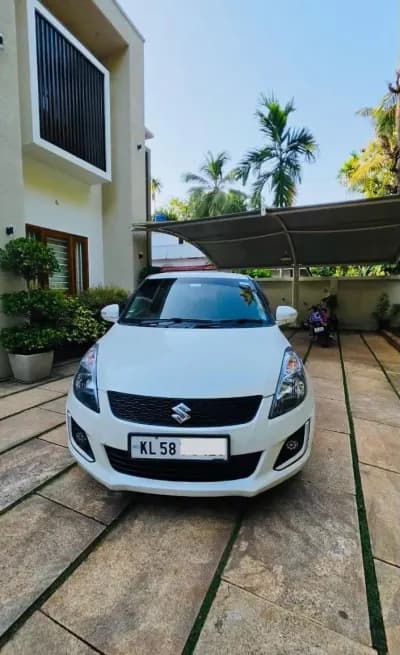 2017 Maruti Suzuki Swift VDi diesel in white, front view – Car City, Mattanur, Kannur