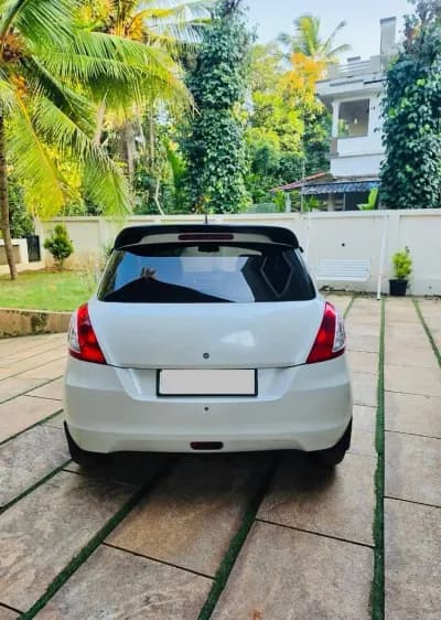 2017 Maruti Suzuki Swift VDi diesel in white, rear view – Car City, Mattanur, Kannur