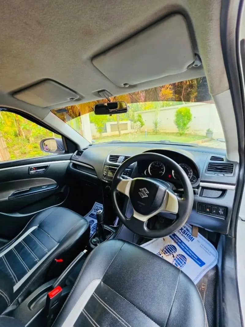 2017 Maruti Suzuki Swift VDi diesel in white, dashboard and manual gear lever – Car City, Mattanur, Kannur