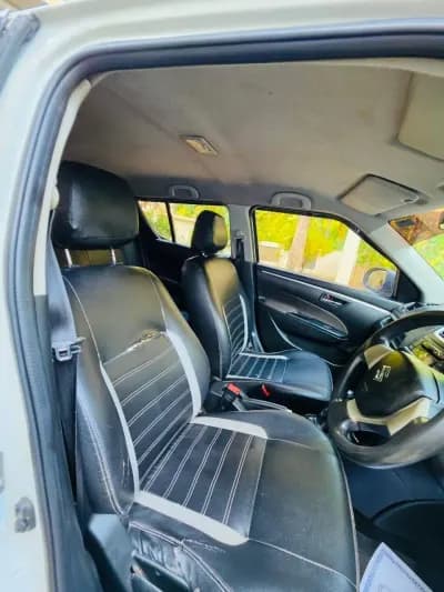 2017 Maruti Suzuki Swift VDi diesel in white, front seats – Car City, Mattanur, Kannur